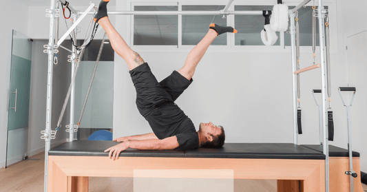 The Pilates Cadillac: A Versatile Machine for Total Body Conditioning